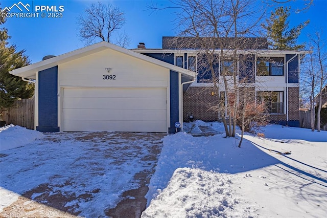 view of front of property featuring a garage