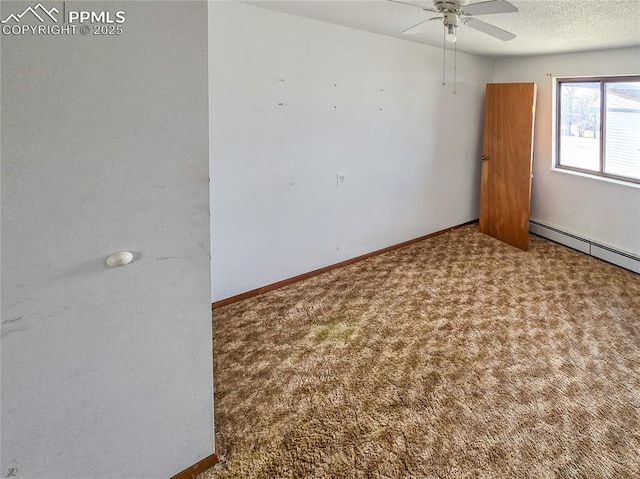 empty room with a baseboard heating unit, carpet floors, a textured ceiling, and ceiling fan