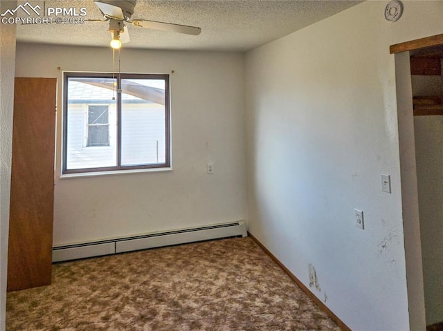 empty room featuring a baseboard radiator, carpet, ceiling fan, and a textured ceiling