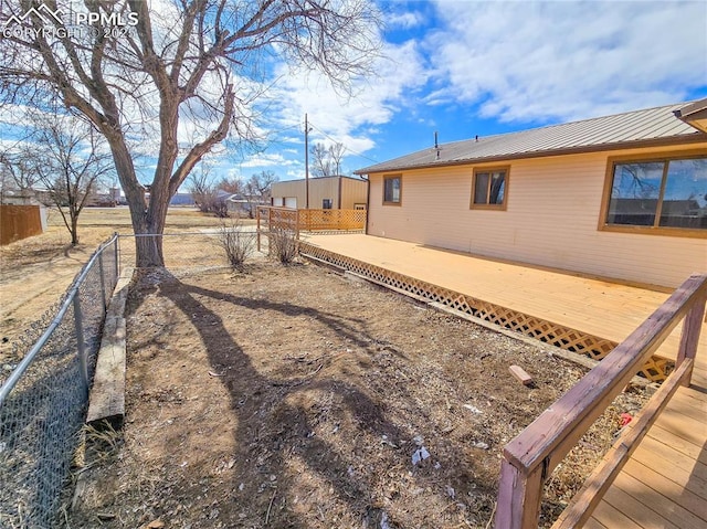 view of yard featuring a wooden deck