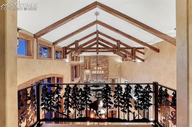 201 Fox Mountain Dr, Woodland Park, CO 80863 - interior space with a notable chandelier, high vaulted ceiling, and beamed ceiling