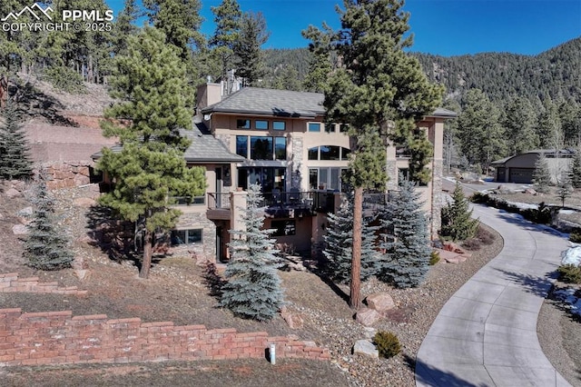 201 Fox Mountain Dr, Woodland Park, CO 80863 - exterior space featuring a balcony