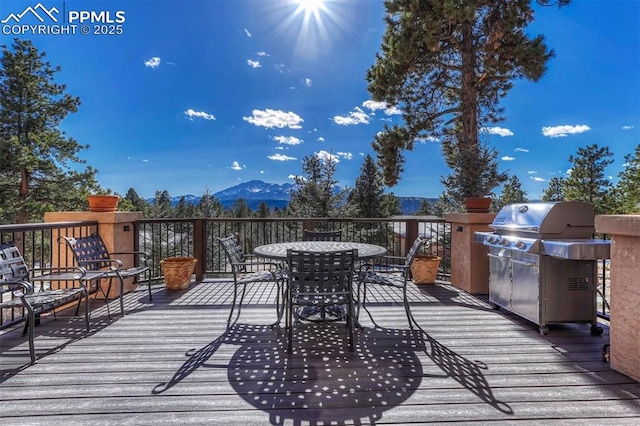 201 Fox Mountain Dr, Woodland Park, CO 80863 - deck featuring area for grilling and a mountain view