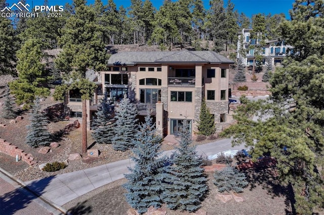 201 Fox Mountain Dr, Woodland Park, CO 80863 - view of front of house with a balcony