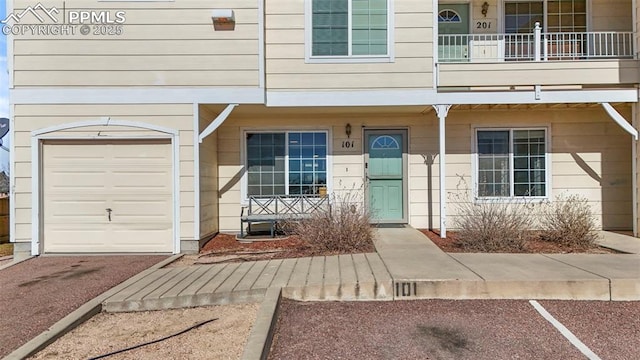 property entrance with a garage