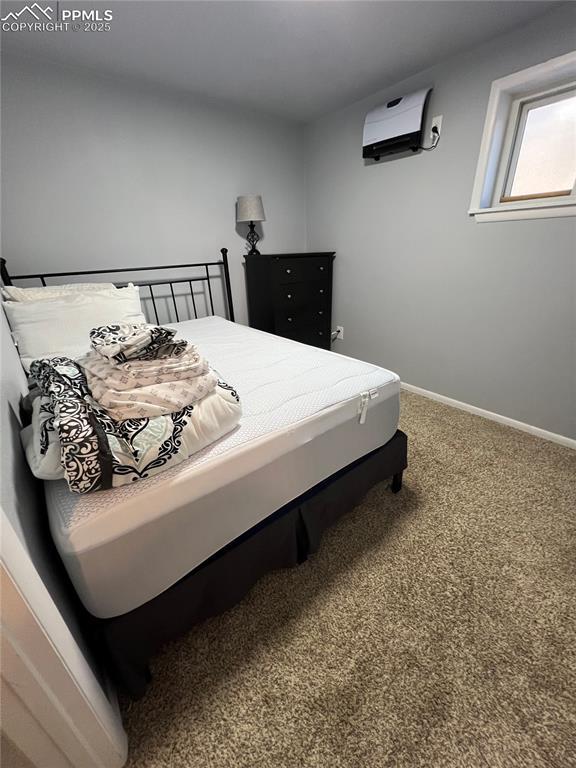 bedroom featuring carpet flooring