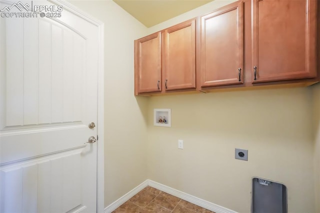 laundry room featuring cabinets, hookup for an electric dryer, and hookup for a washing machine