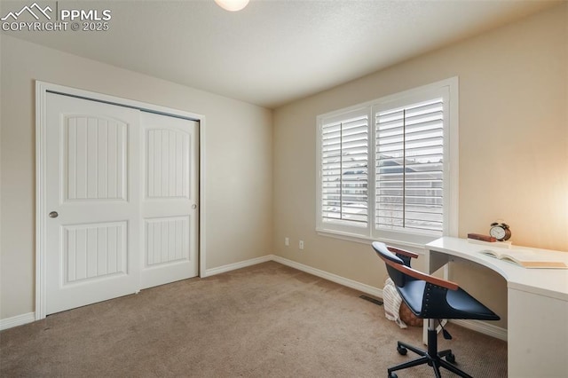 office space featuring light colored carpet