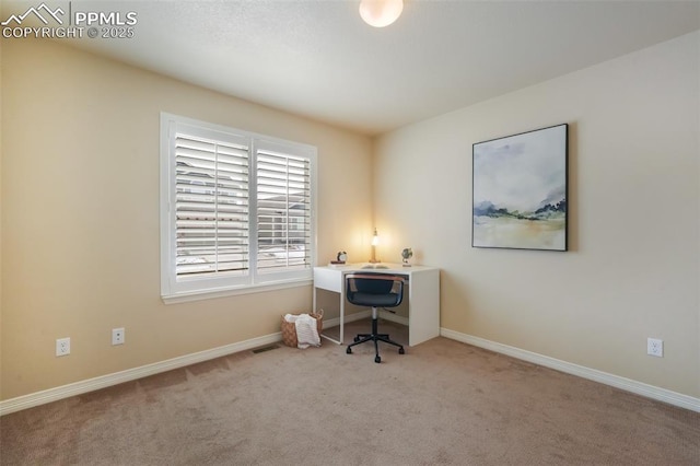 view of carpeted office space