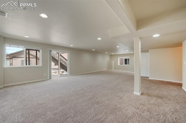 basement with light carpet