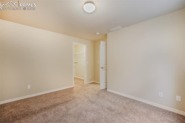 view of carpeted spare room