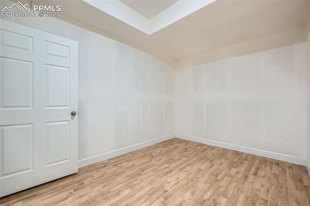 spare room with light wood-type flooring