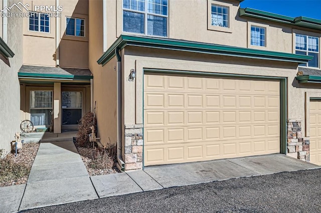 exterior space with a garage