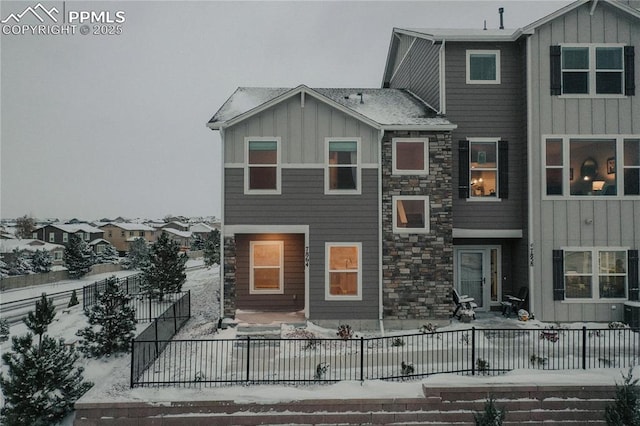 view of snow covered house