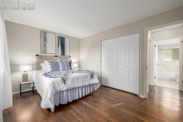 bedroom with dark hardwood / wood-style flooring and a closet