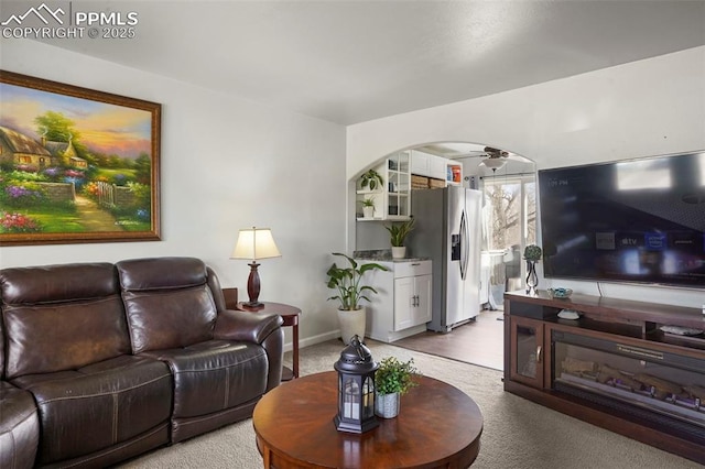 living room featuring ceiling fan