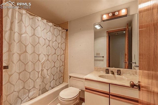 full bathroom featuring vanity, toilet, and shower / bath combo with shower curtain