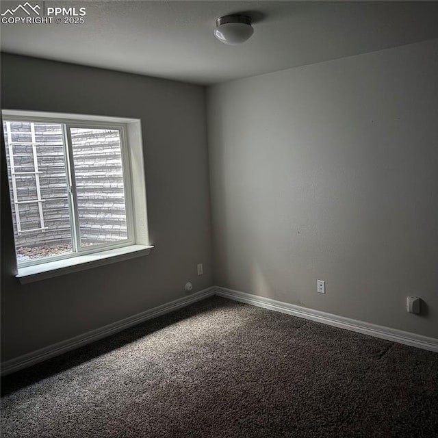 view of carpeted spare room