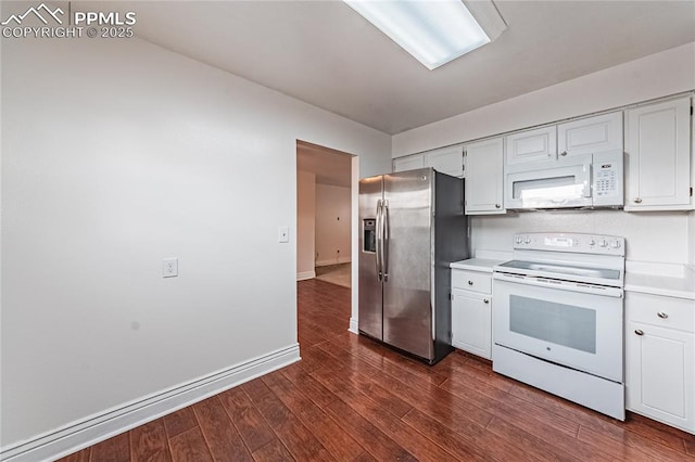 kitchen featuring white cabinetry, dark hardwood / wood-style flooring, and white appliances