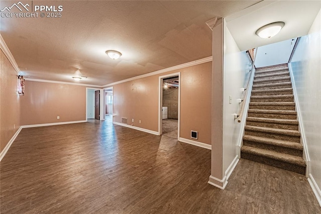 unfurnished room featuring dark wood-type flooring and ornamental molding