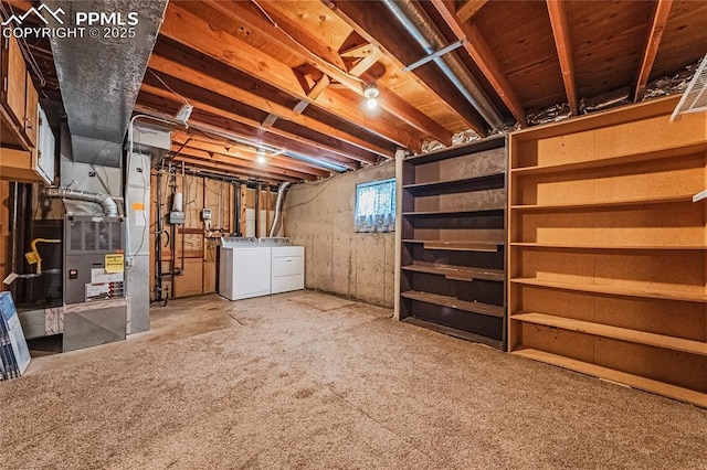 basement featuring washer and clothes dryer