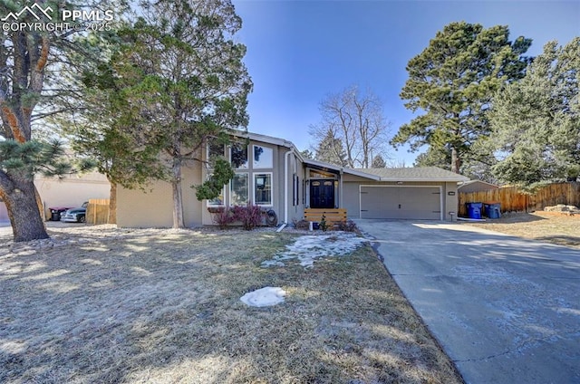 view of front of property featuring a garage