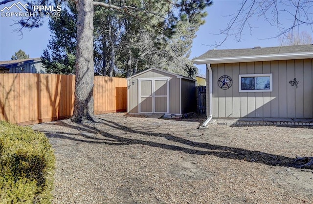 exterior space with a shed