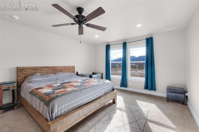 carpeted bedroom featuring ceiling fan