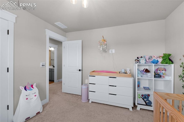 bedroom with light carpet