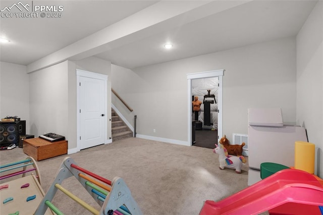 recreation room with carpet floors