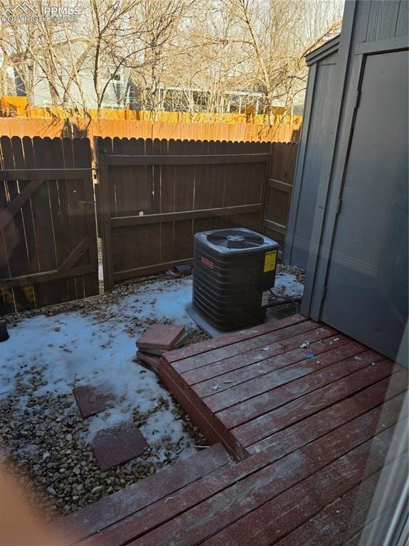 wooden deck with central AC unit