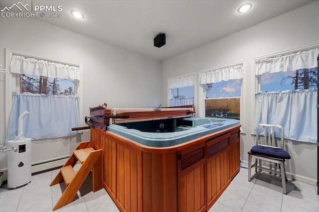 miscellaneous room featuring a baseboard heating unit, a jacuzzi, light tile patterned floors, and recessed lighting