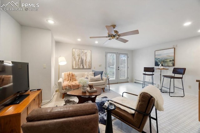 living room featuring light carpet, a ceiling fan, a baseboard heating unit, recessed lighting, and french doors