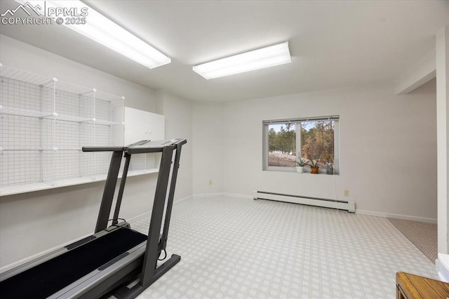 exercise room featuring carpet flooring, baseboards, and baseboard heating