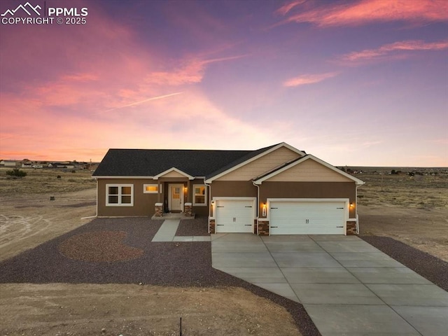 view of front of property featuring a garage