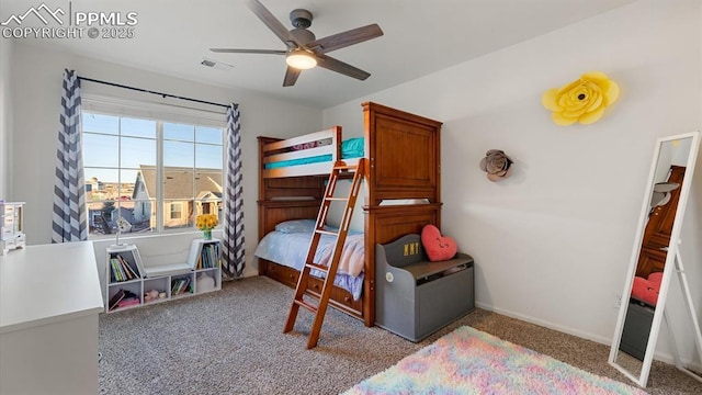 bedroom featuring light carpet and ceiling fan