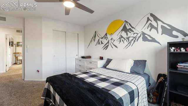 carpeted bedroom featuring ceiling fan and a closet