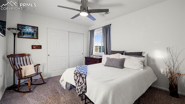 carpeted bedroom featuring a closet and ceiling fan