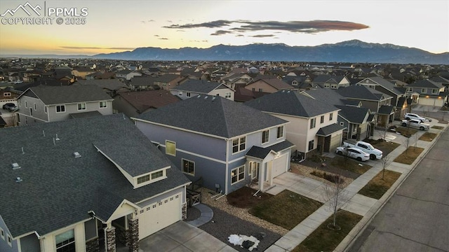 aerial view at dusk with a mountain view