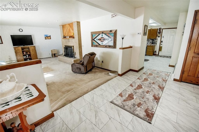 living room featuring a brick fireplace