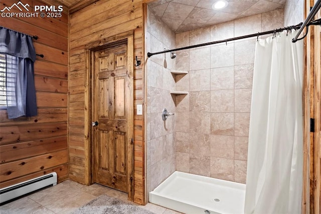 bathroom featuring a baseboard radiator, wood walls, and a shower with shower curtain