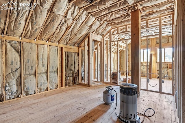 miscellaneous room featuring lofted ceiling