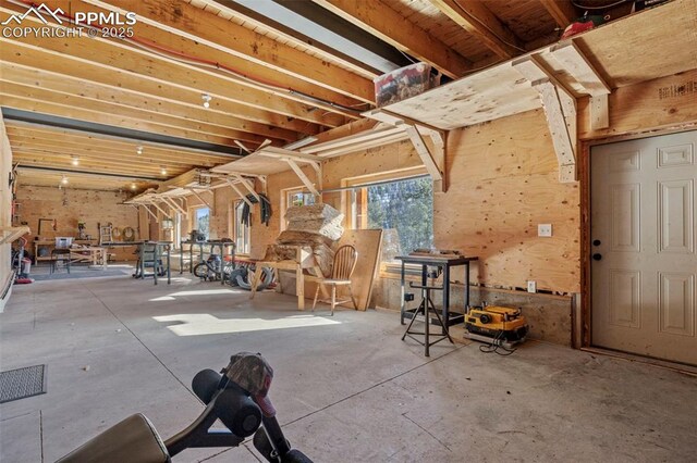 interior space featuring concrete flooring