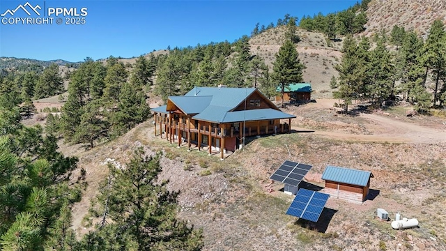 drone / aerial view featuring a mountain view