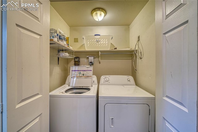 laundry area featuring laundry area and washing machine and dryer