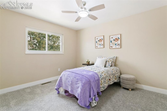 bedroom with ceiling fan and carpet flooring