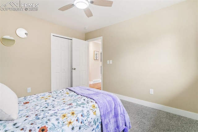 bedroom with carpet floors, a closet, and ceiling fan