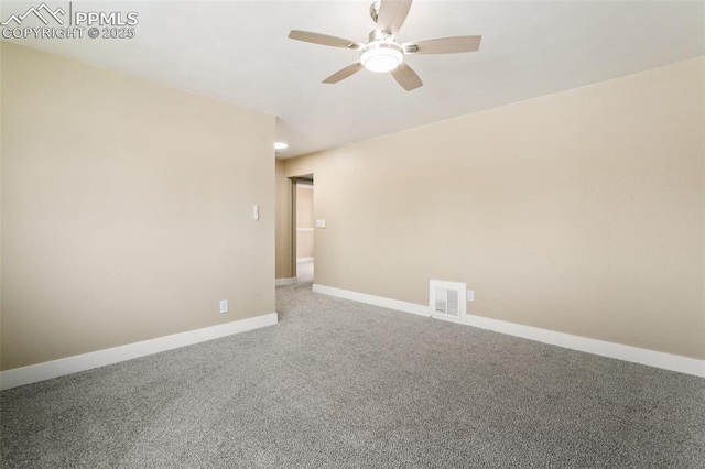 carpeted empty room featuring ceiling fan