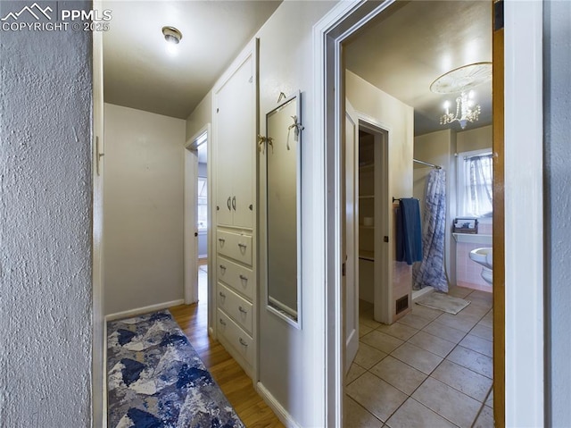 hall featuring light hardwood / wood-style flooring