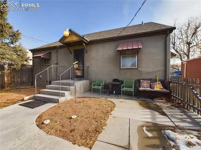 view of front of house featuring a patio